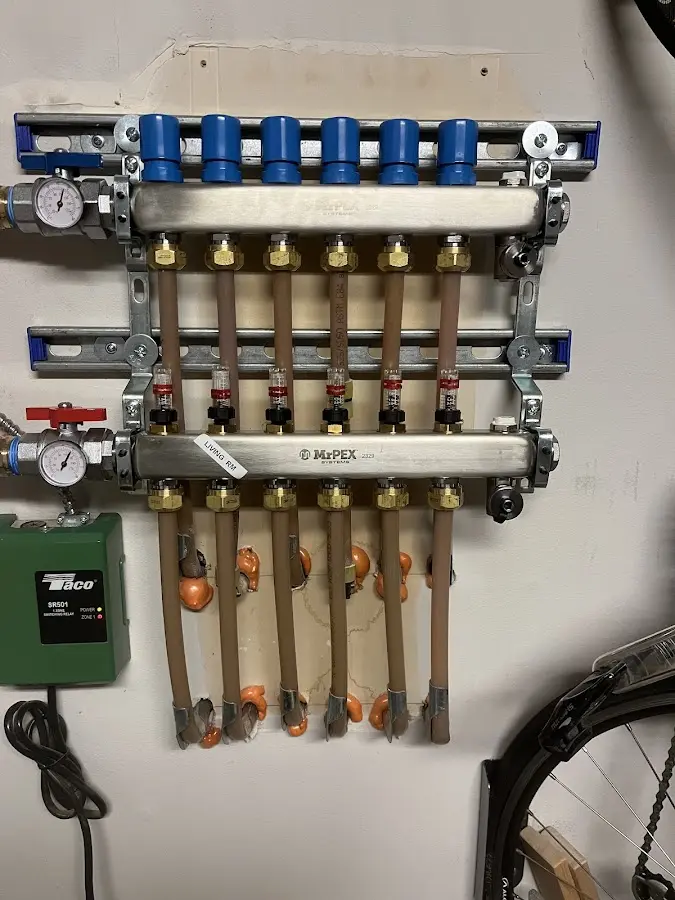 Plumber performing Gas Line Installation at a residential property in Big Rapids